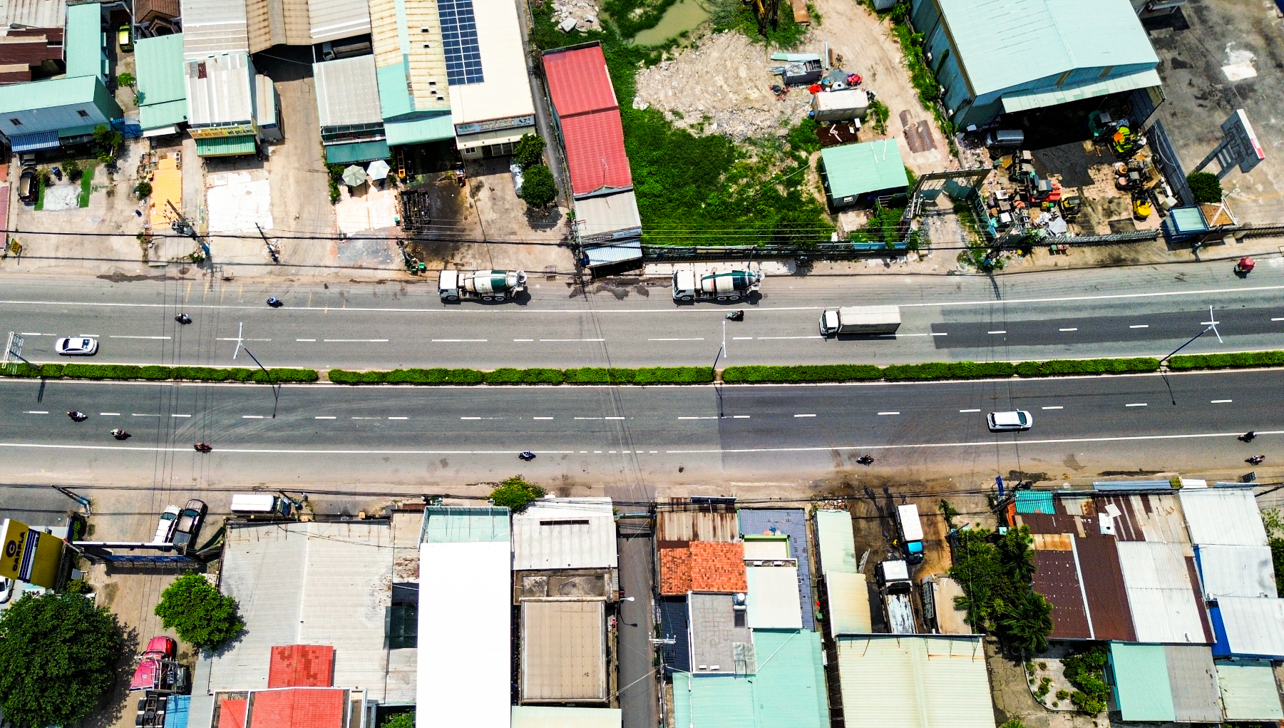 Cảnh đối lập trên con đường huyết mạch nối Thành phố Hồ Chí Minh và Bình Dương: Nơi là đại lộ 8 làn xe, nơi đang chuẩn bị 14.000 tỷ để mở rộng- Ảnh 4.