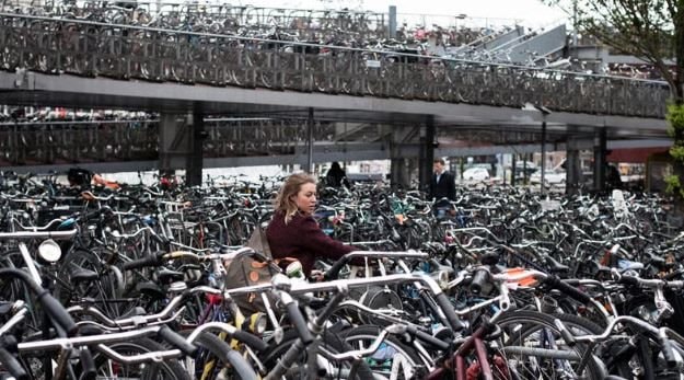 Xe đạp điện giúp tiết kiệm hàng chục kg CO₂ mỗi tuần- Ảnh 2.