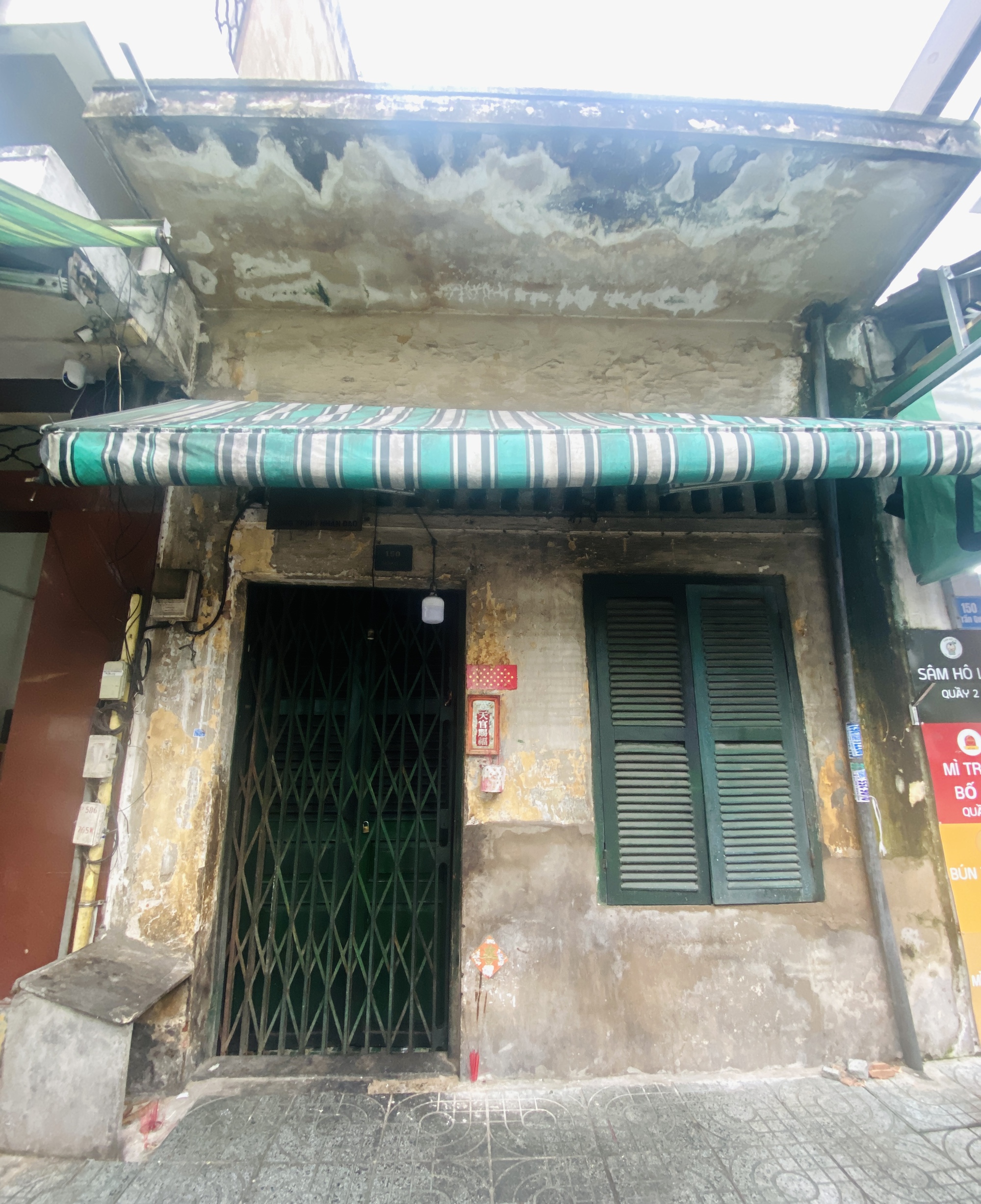 Bên trong một căn nhà ở Chợ Lớn của những người phụ nữ "thề không lấy chồng": Những nghi lễ kỳ lạ- Ảnh 1. Bên trong một căn nhà ở Chợ Lớn của những người phụ nữ "thề không lấy chồng": Những nghi lễ kỳ lạ- Ảnh 1.