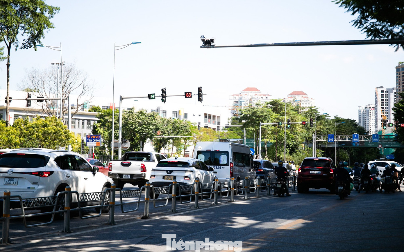 ‘Mắt thần' AI giăng khắp đường phố Hà Nội, người đi xe máy vẫn vô tư vượt đèn đỏ- Ảnh 14.