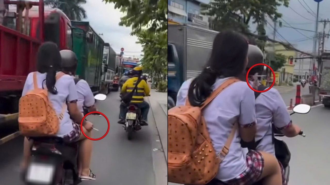 CLIP: Hai nữ sinh vừa chạy xe máy vừa hút thuốc ở TP HCM- Ảnh 1. CLIP: Hai nữ sinh vừa chạy xe máy vừa hút thuốc ở TP HCM- Ảnh 1.