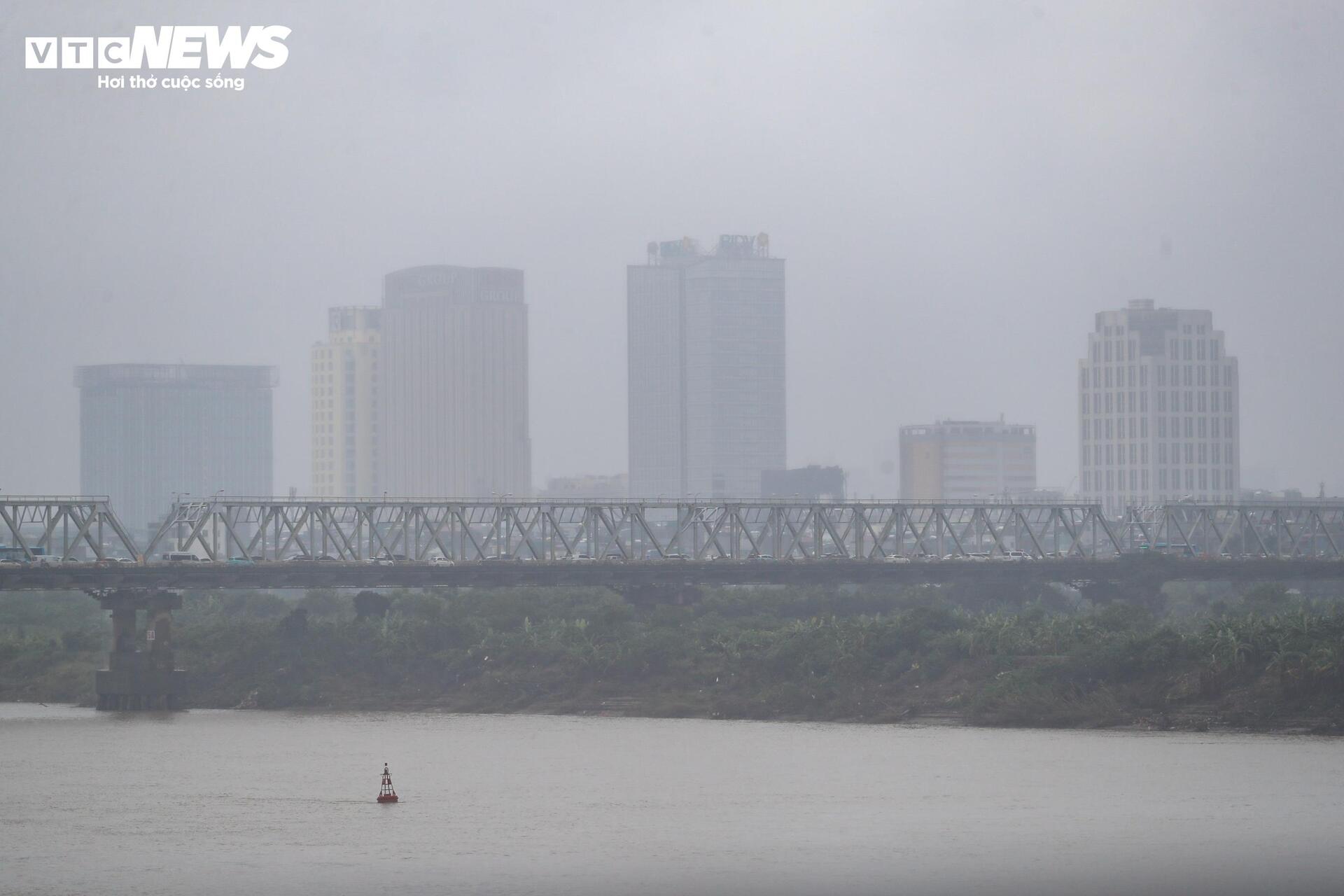 Người Hà Nội vất vả mưu sinh trong ngày mưa phùn, gió lạnh tăng cường- Ảnh 5.