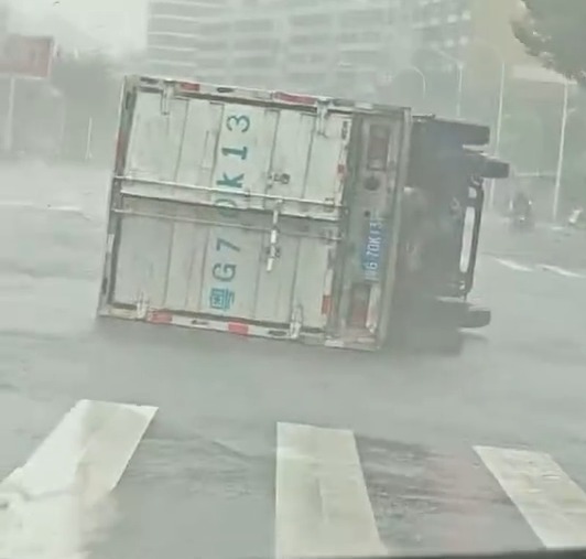 Những hình ảnh cận cảnh bão Matmo càn quét Trung Quốc- Ảnh 4. Những hình ảnh cận cảnh bão Matmo càn quét Trung Quốc- Ảnh 4.