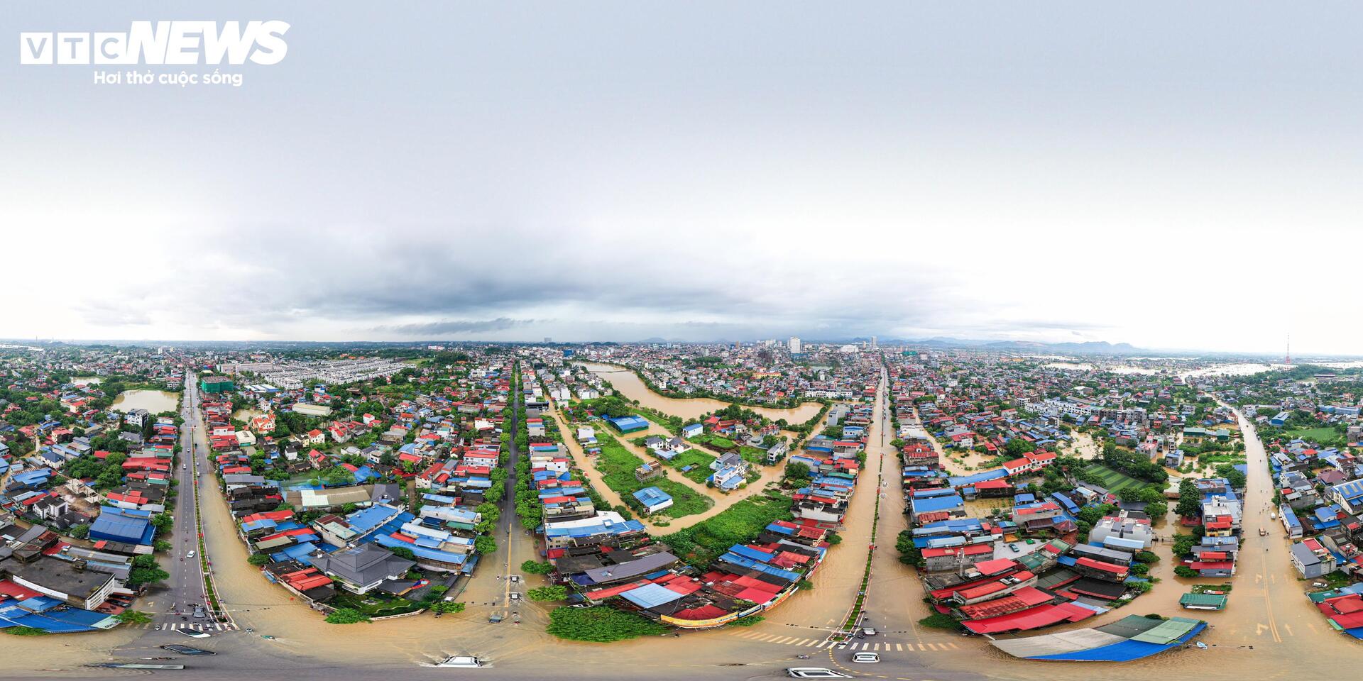 Phố trung tâm Thái Nguyên chìm trong biển nước, có nơi ngập gần nóc tầng một- Ảnh 1.