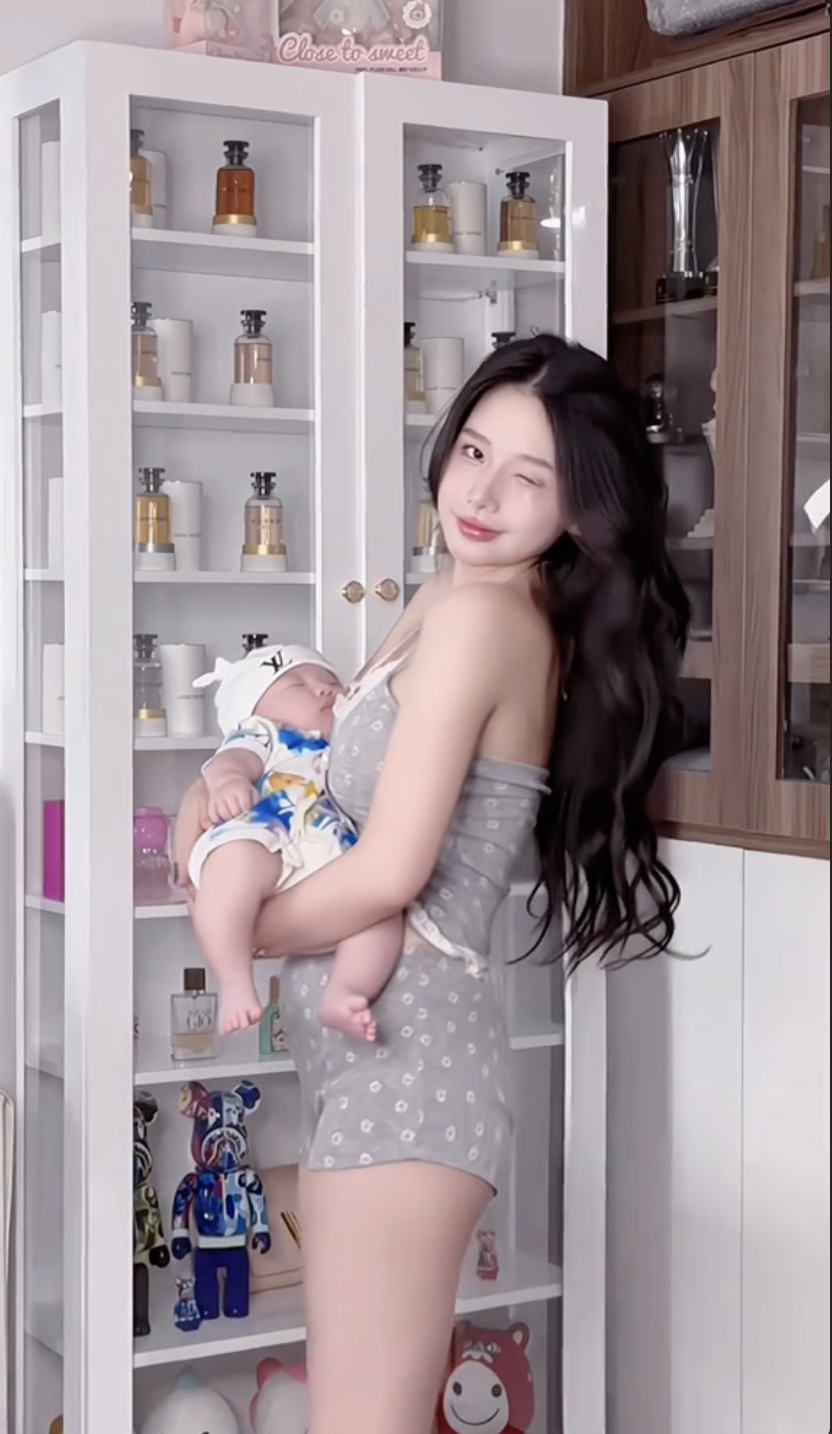 Mẹ bỉm bế con hot điên đảo, netizen truy tìm danh tính người chồng may mắn: Hoá ra là 