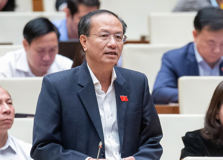 Đại biểu đề xuất miễn giấy phép xây dựng nhà ở dưới 7 tầng, Bộ trưởng nói gì? - Ảnh 1.