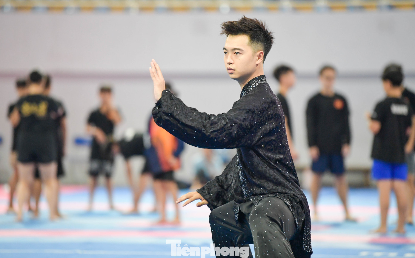 SEA Games 33: Chiêm ngưỡng thần thái đầy mê hoặc của các tuyển thủ wushu Việt Nam- Ảnh 3.