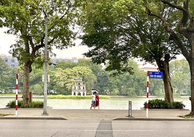 Nên bỏ cấp quận và thành phố thuộc tỉnh để cải cách chính quyền? - Ảnh 1.