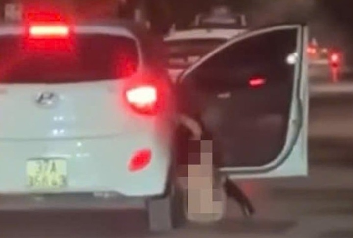 Vụ người phụ nữ văng khỏi xe ôtô ở TP Vinh gây xôn xao mạng xã hội - Ảnh 1.