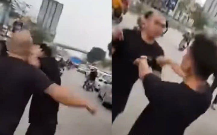 Công an điều tra xô xát bệnh viện Bạch Mai giữa tài xế taxi và bảo vệ - Ảnh 1.