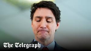 Thủ tướng Canada rơi nước mắt trong họp báo - Ảnh 1. Thủ tướng Canada rơi nước mắt trong họp báo - Ảnh 1.