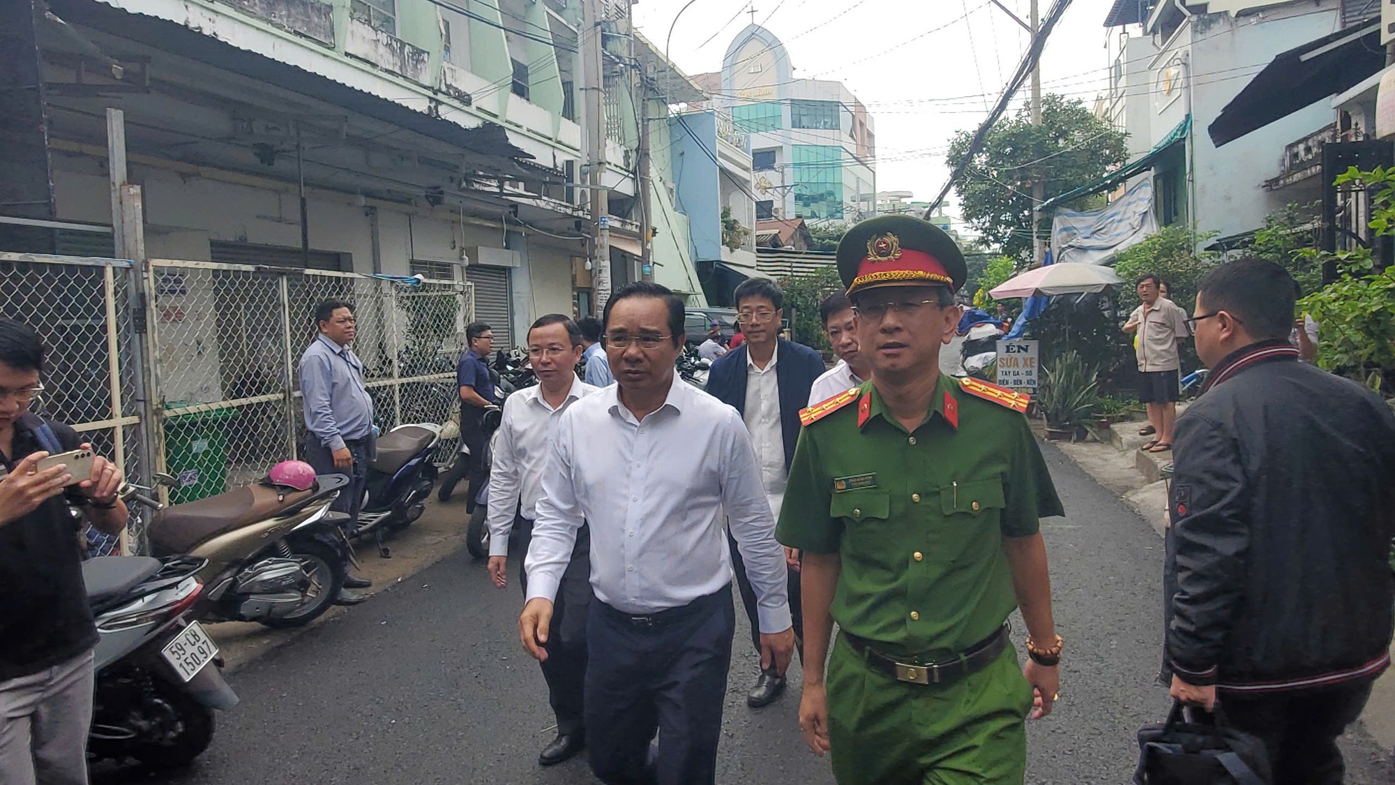 Đau lòng mẹ cứu con trong vụ cháy Xóm Củi - Ảnh 2. Đau lòng mẹ cứu con trong vụ cháy Xóm Củi - Ảnh 2.