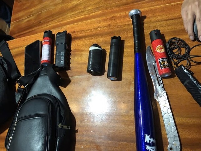 Triệt phá ổ nhóm cho vay nặng lãi ở Lâm Đồng đe dọa dân tộc thiểu số - Ảnh 2.