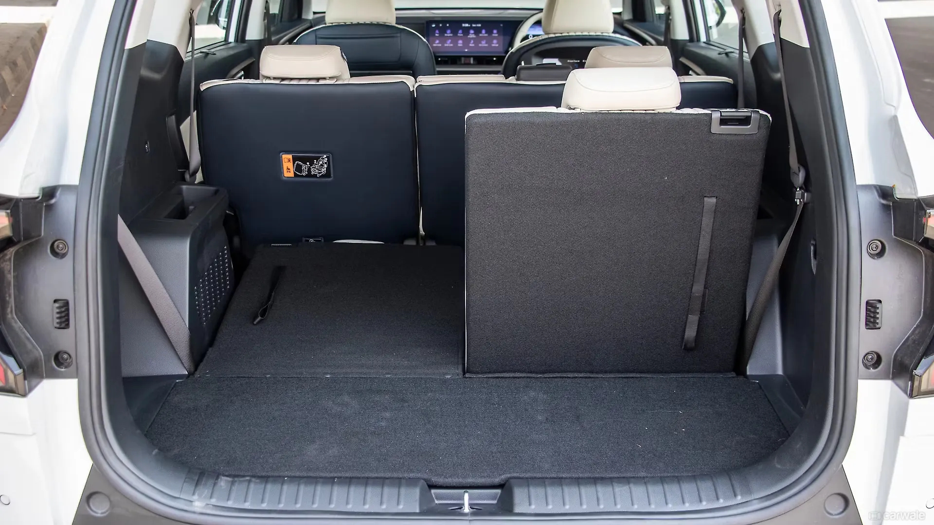 Ảnh thực tế Kia Carens Clavis vừa ra mắt: Có phanh tay điện tử, đồng hồ tốc độ 12 inch và 20 tính năng ADAS cấp độ 2 - Ảnh 23.