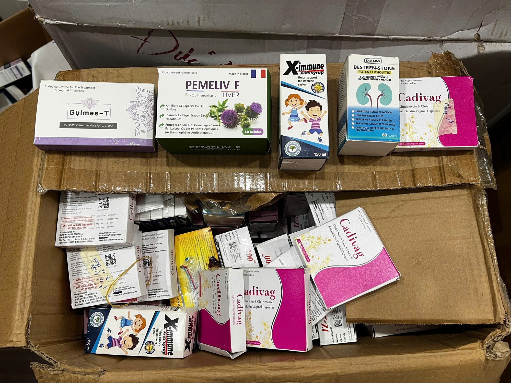 Cận cảnh thuốc thực phẩm chức năng giả bị thu giữ tại Hà Nội - Ảnh 2. Cận cảnh thuốc thực phẩm chức năng giả bị thu giữ tại Hà Nội - Ảnh 2.