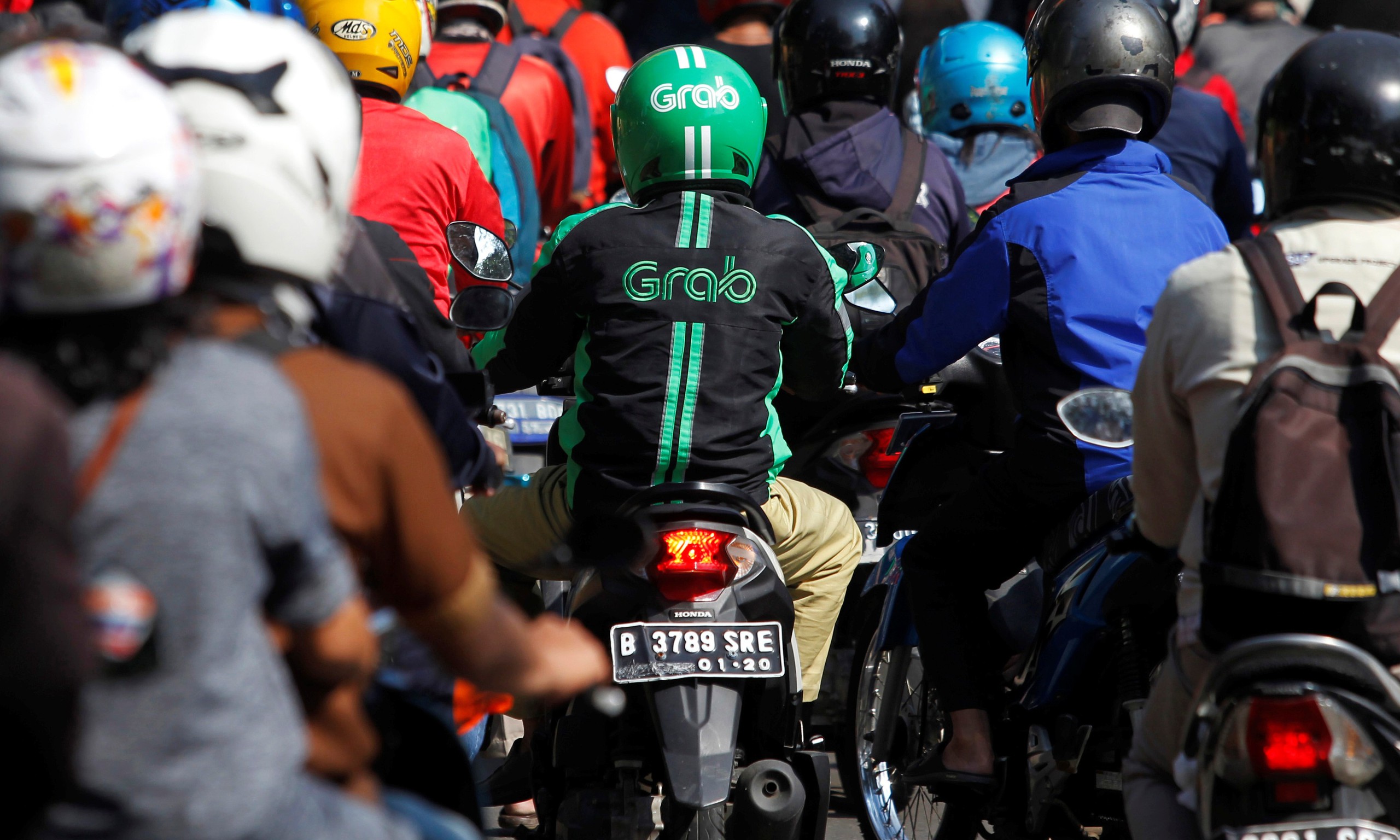 Kiếm được 200k/ngày mà phải "cắt máu" đến 20%: Chạy cho Grab, Gojek ở đây không như là mơ - Ảnh 3.