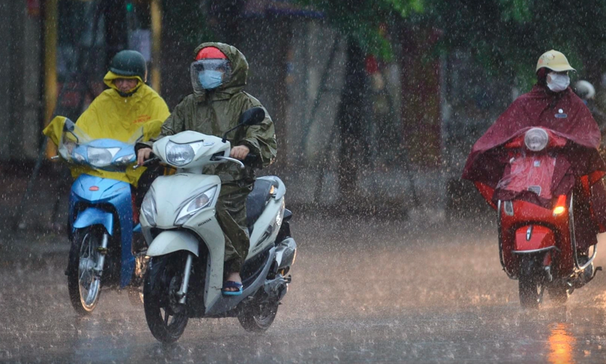 Miền Bắc bất ngờ đón thêm một đợt không khí lạnh mới, mưa rất to - Ảnh 1.