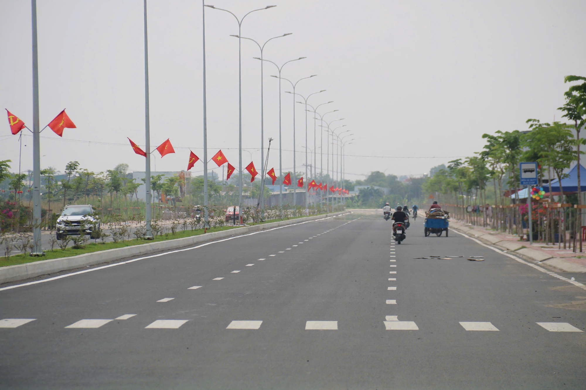 Giữa mùa mưa, công trình quốc lộ 50 vẫn chạy nước rút - Ảnh 1.