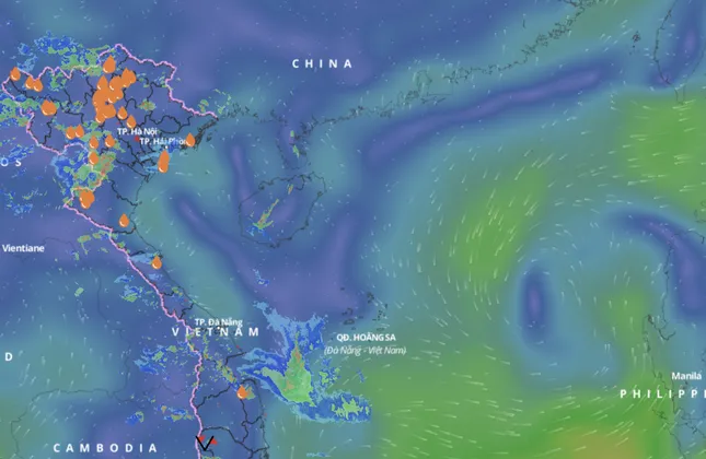 Vùng áp thấp trên biển Đông có khả năng mạnh lên thành áp thấp nhiệt đới - Ảnh 1.