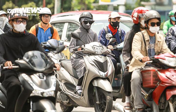 Nắng nóng trở lại miền Bắc sau mưa lớn kéo dài từ ngày 3 / 7 - Ảnh 1.