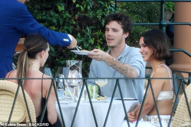David Beckham bị paparazzi 