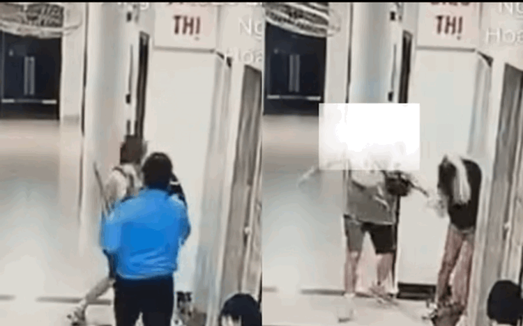VIDEO: Một phụ nữ bị người đàn ông đánh túi bụi vào đầu, mặt khi chờ thang máy- Ảnh 1.