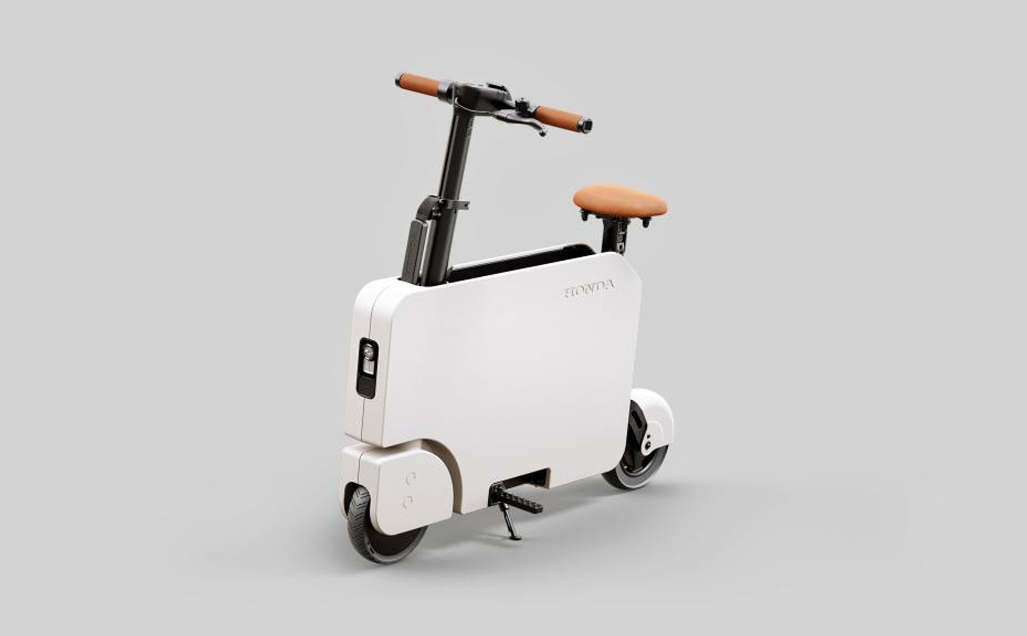 Mẫu xe điện từng gây bão của Honda: Gấp gọn như vali, giá 25 triệu đồng- Ảnh 3. Mẫu xe điện từng gây bão của Honda: Gấp gọn như vali, giá 25 triệu đồng- Ảnh 3.
