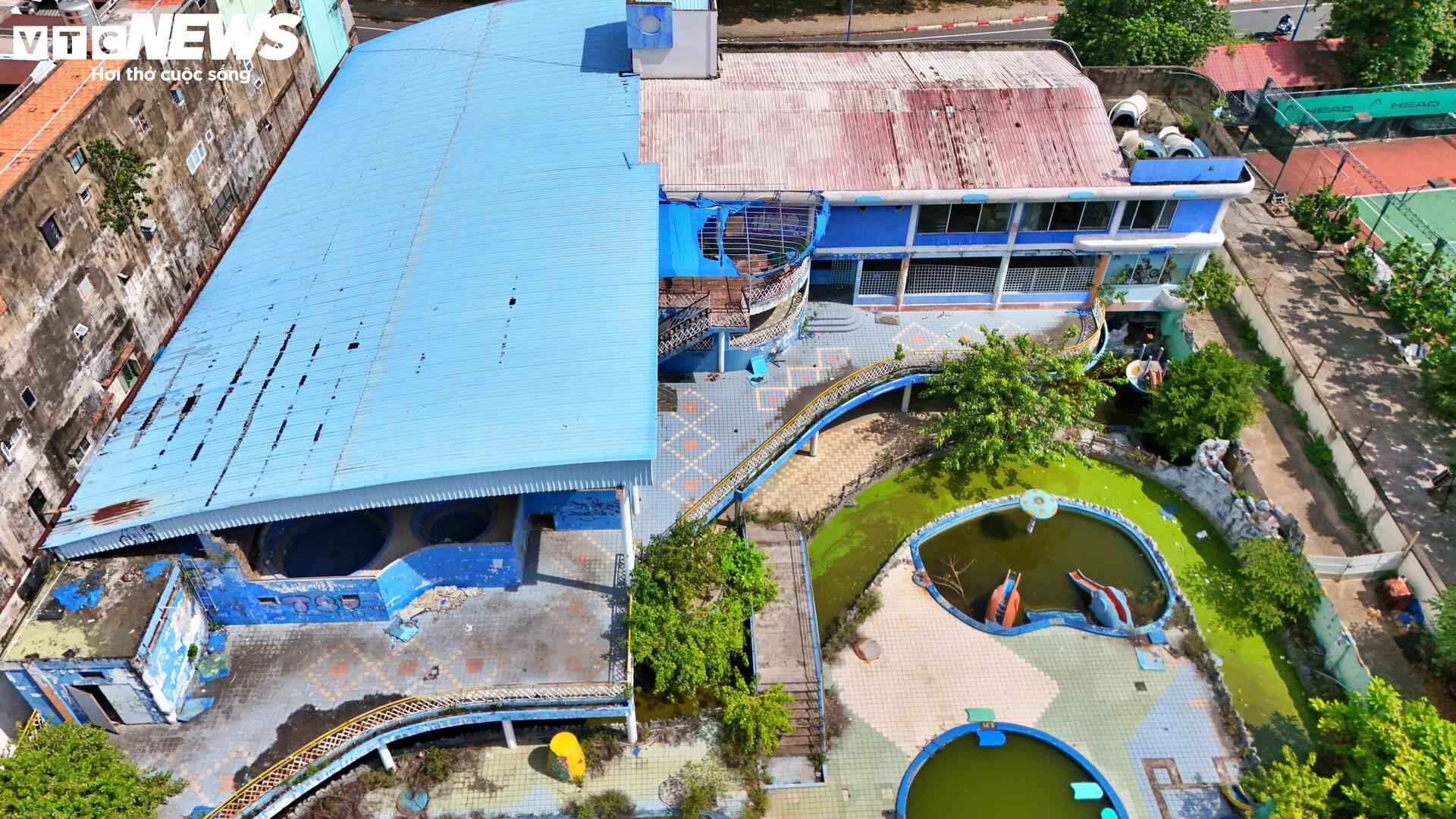 Cảnh hoang tàn của công viên nước từng sôi động bậc nhất TP.HCM - Ảnh 11.