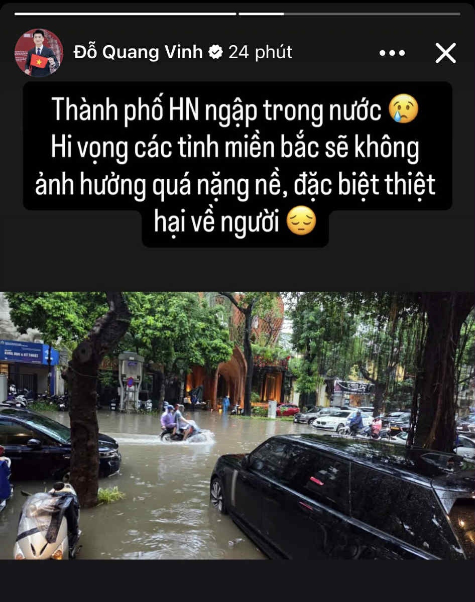 Phó tổng Đỗ Quang Vinh xắn quần lội ra ô tô trong ngày Hà Nội 
