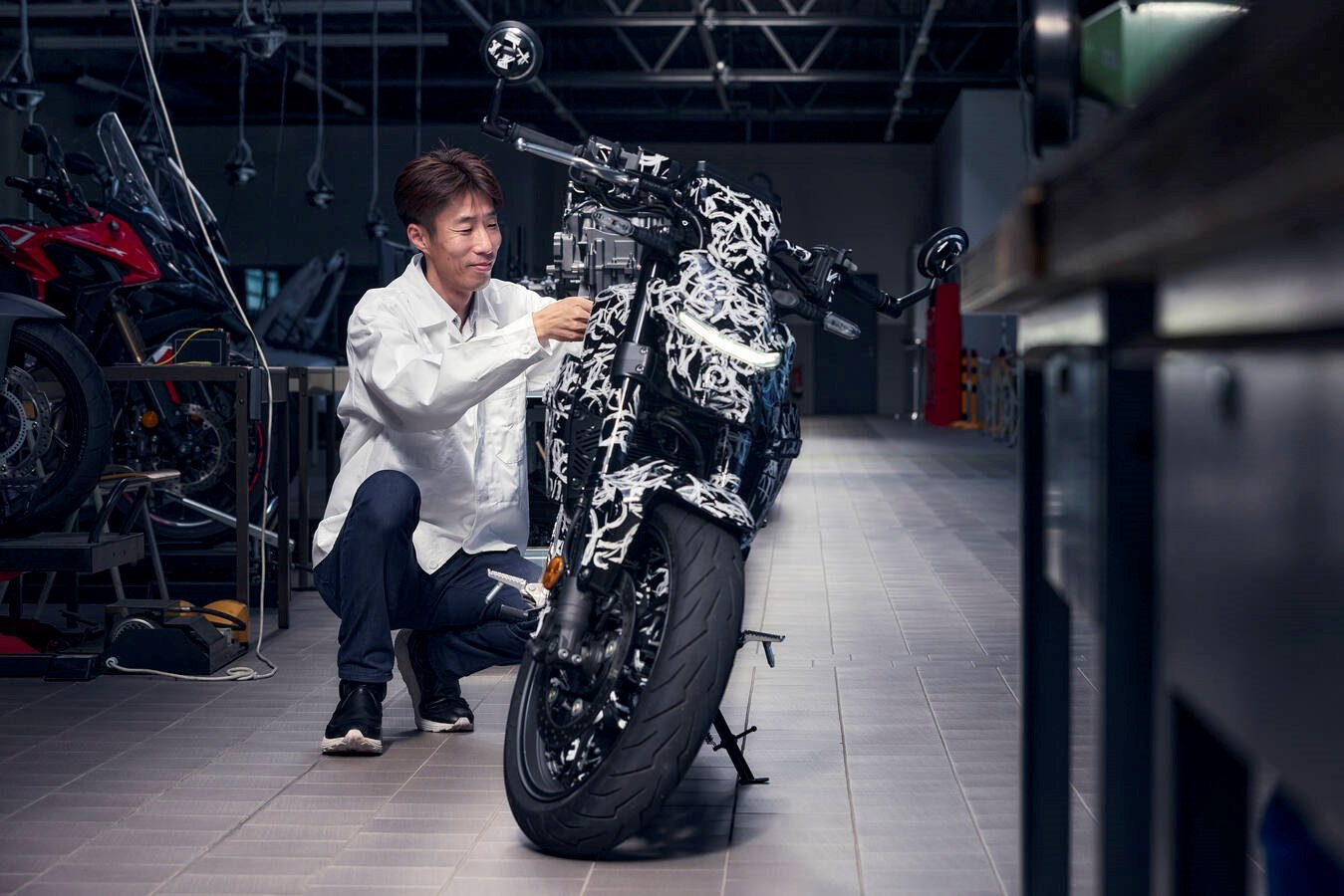 Hé lộ thêm về xe máy điện Honda sạc được chung với ô tô - Ảnh 9.