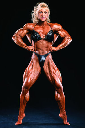 Nữ "qu&aacute;i vật thể h&igrave;nh" g&acirc;y sốc với vai rộng, lưng d&agrave;y, đ&ugrave;i khổng lồ - Ảnh 3.