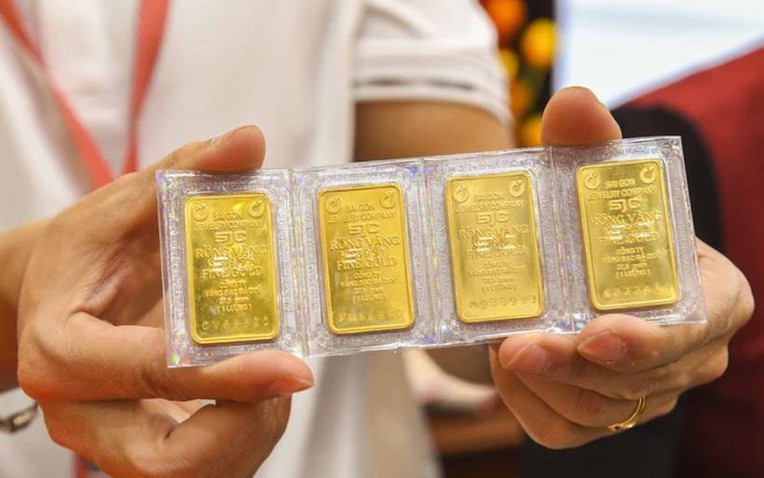 Giá vàng giảm thủng đáy, nhà vàng thông báo ngừng bán vì quá tải! - Ảnh 1.