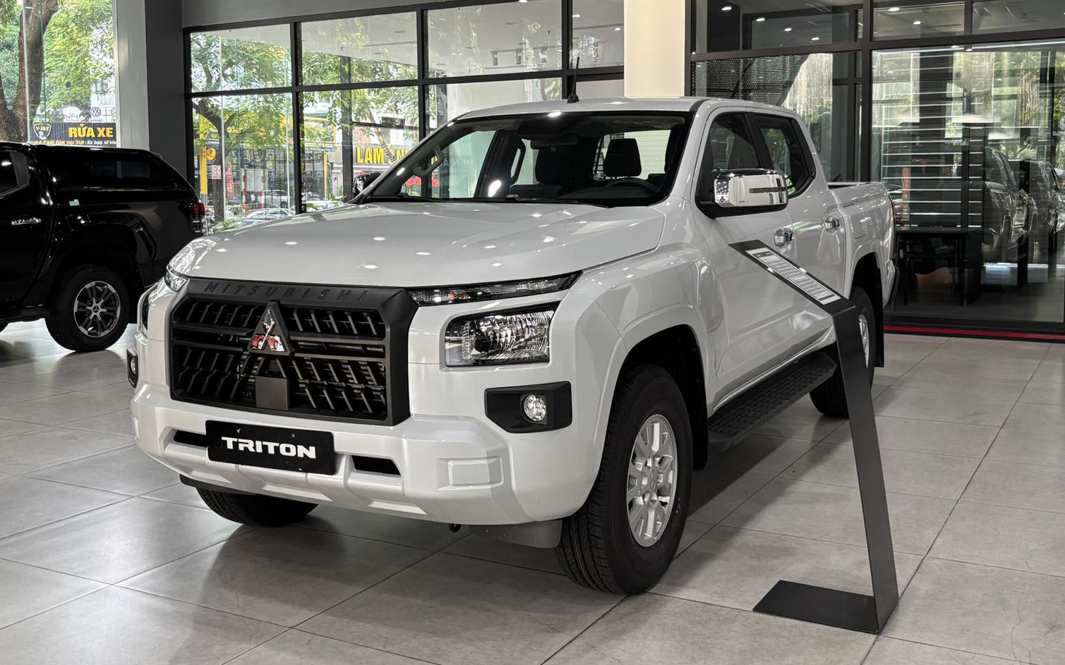 Xe Mitsubishi vừa xuất xưởng năm nay đ&atilde; giảm gi&aacute; lăn b&aacute;nh, Destinator thực tế rẻ hơn Territory- Ảnh 4.