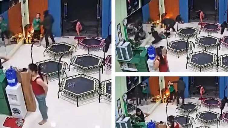 VIDEO: Người đ&agrave;n &ocirc;ng bịt mặt x&ocirc;ng v&agrave;o ph&ograve;ng tập thể dục cướp d&acirc;y chuyền  - Ảnh 1.