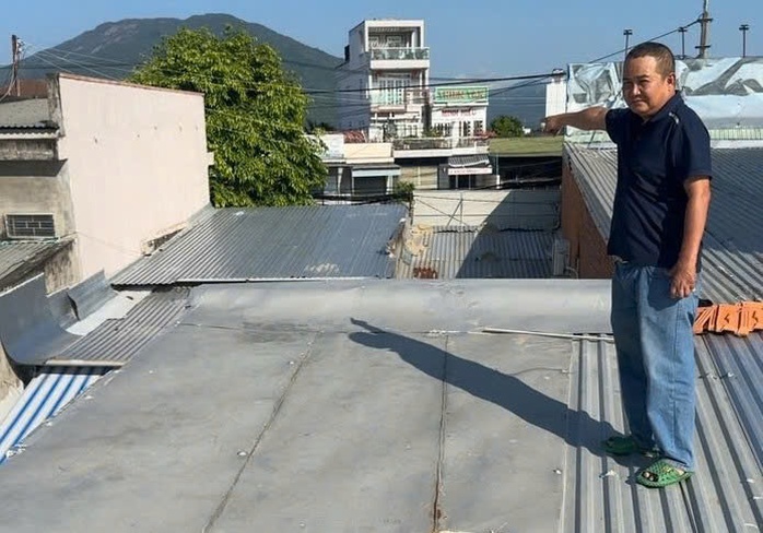 Tranh cãi quanh vụ cho đất bằng chữ ký "giả" - Ảnh 1. Tranh cãi quanh vụ cho đất bằng chữ ký "giả" - Ảnh 1.