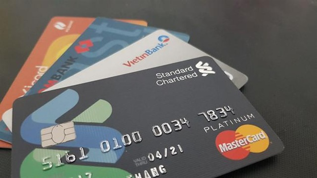 - Ảnh 1. Chính phủ đặt mục tiêu ít nhất 30% người trưởng thành có tiền gửi tiết kiệm tại ngân hàng - Ảnh 1.