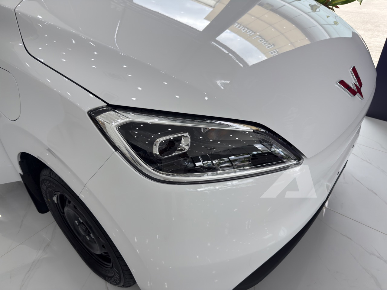 Soi MPV điện Wuling Grango vừa về đại lý: Xe 7 chỗ giá 499 triệu, cỡ mâm độc lạ, sạc 30 phút được 80% pin - Ảnh 4.