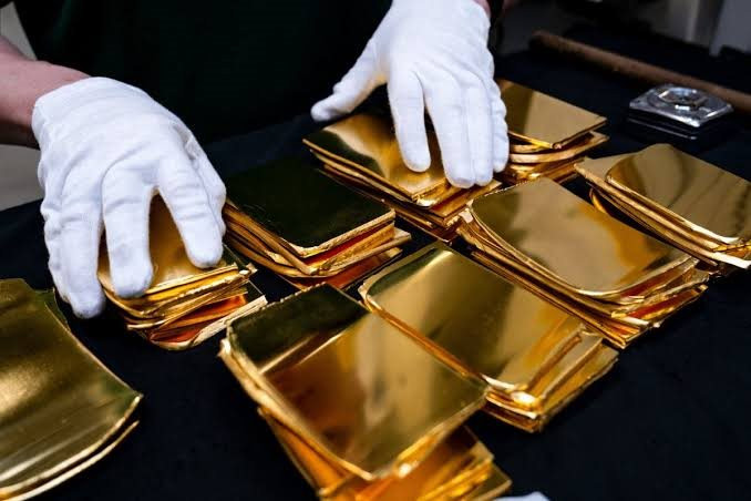 Gi&aacute; v&agrave;ng tăng mạnh nhất hơn 2 th&aacute;ng , qũy SPDR gom 20 tấn v&agrave;ng - Ảnh 1.