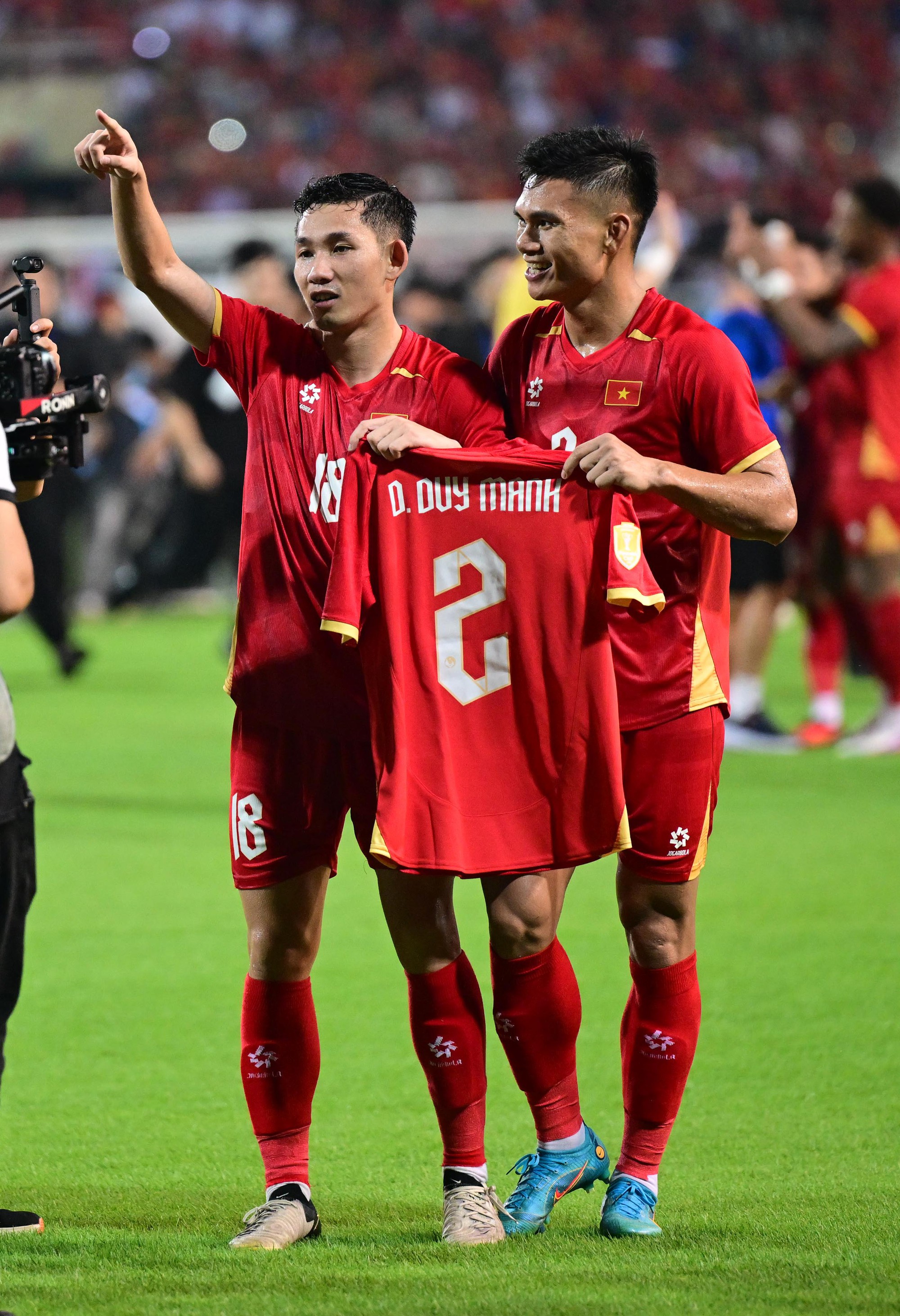 ĐT Việt Nam v&ocirc; địch ASEAN Cup 2026: HLV Kim Sang - sik v&agrave; niềm vui Duy Mạnh - Ảnh 4.
