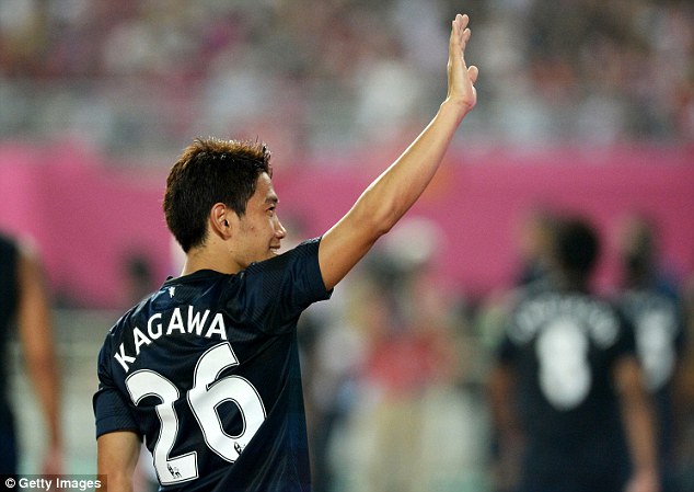 
	Kagawa trên đường rời Man United