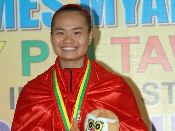  	Nguyễn Thị Yến xuất sắc giành Huy chương vàng hạng cân 75kg nữ. (Ảnh: Quang Nhựt/TTXVN)