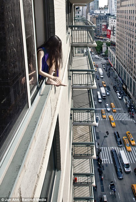 Crouch: A camera with a timer allows the South Korean to capture herself in a series of poses