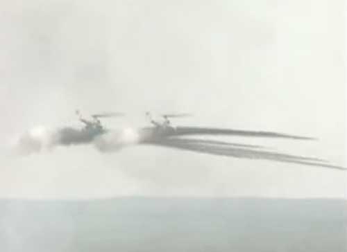 
	2 chiếc trực thăng tấn công Mi-24D đang phóng rocket tiêu diệt mục tiêu. Ảnh minh họa.