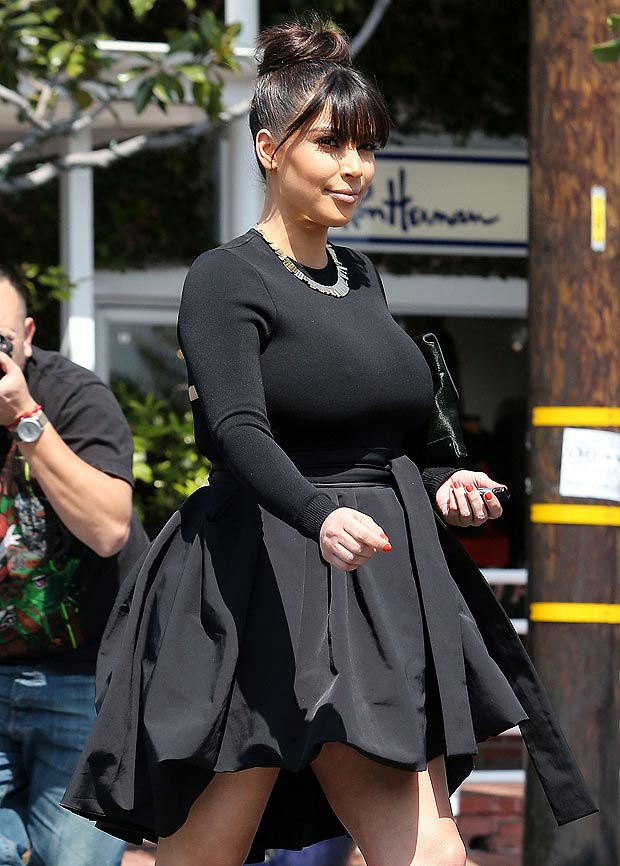 Kim Kardashian in a short black dress