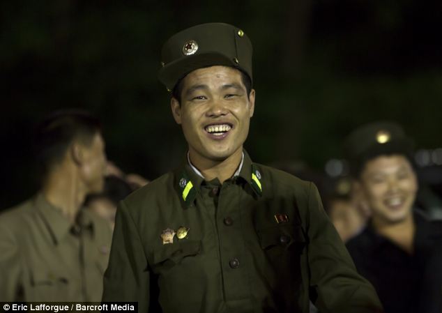Beaming: Another soldier has a laugh and a joke