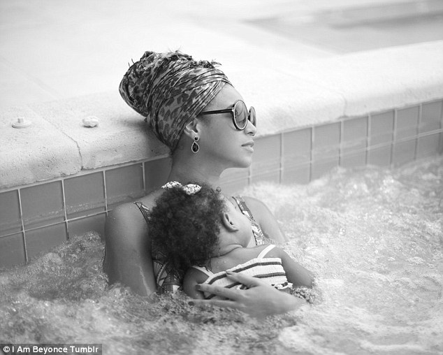 Motherly love: Beyonce posted an intimate picture of her with baby Blue Ivy Carter snuggling in a hot tub while on vacation to her Tumblr