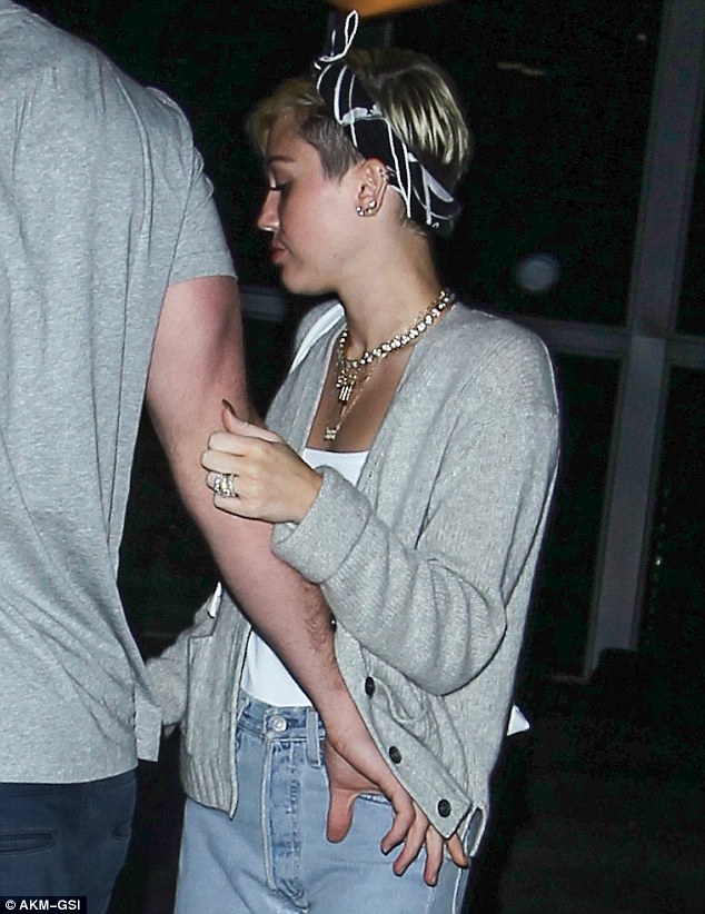 It's a bling thing: Miley was once again wearing her engagement ring 