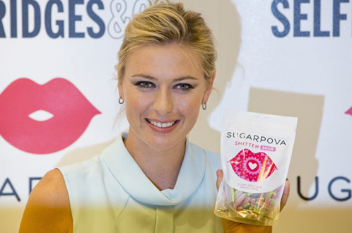 
	Sharapova quảng bá cho thương hiệu kẹo của riêng mình mang tên Sugarpova - Ảnh: AFP