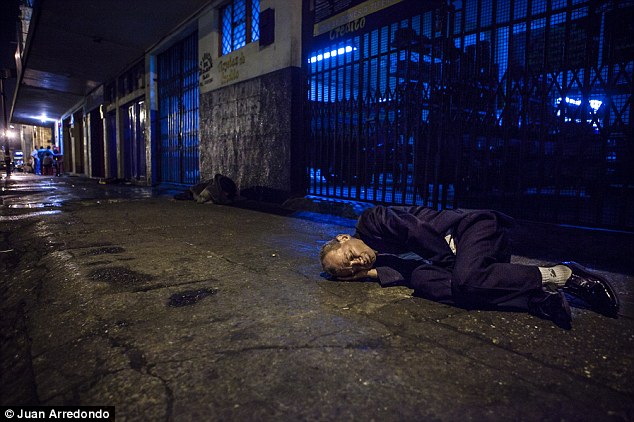 Displaced: With nowhere else to go, this drunk is forced to sleep on the sidewalk