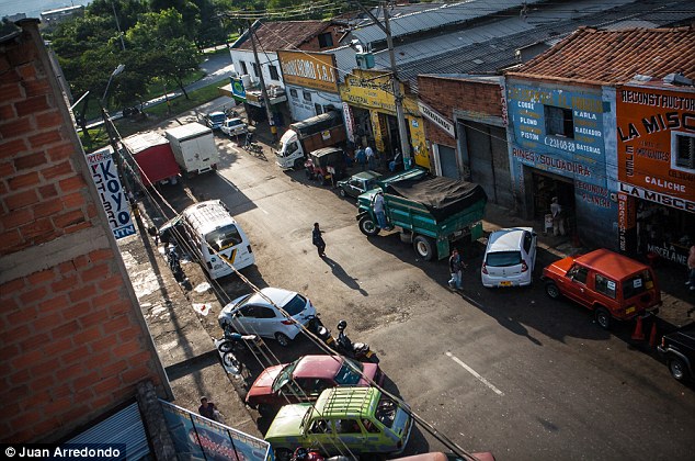 Motor city: By day mechanics and car workshops are the main trade